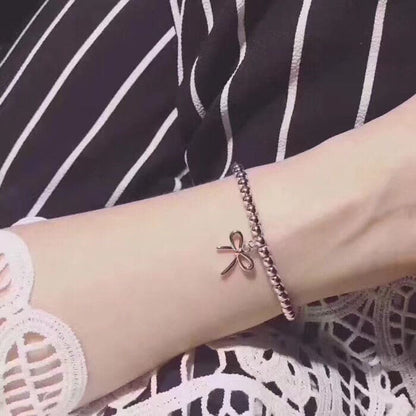 18K Celestial T Bow Charm Bead Bracelet